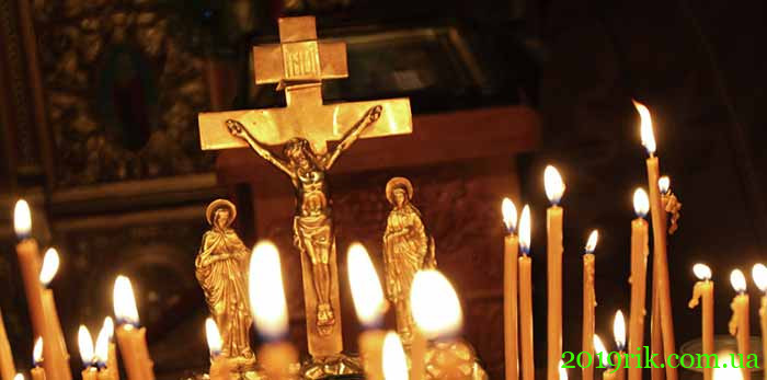 Православний хрест та свічки